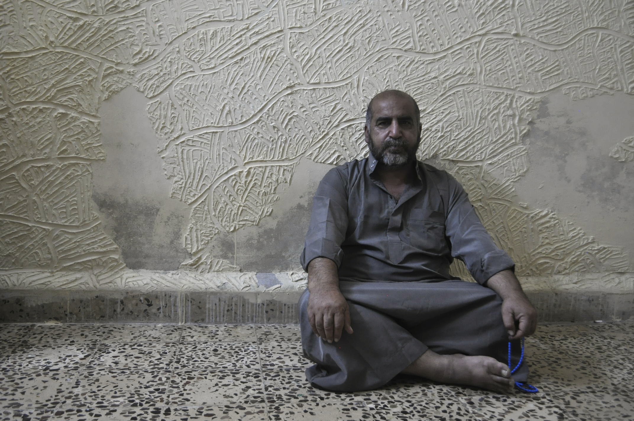 Jordan is the third asylum stop this Iraqi refugee has made, as he first fled to Syria, then back to Baghdad, and now here from successive conflicts. He has suffered mental illness since 2010. Image by Alice Su. Jordan, 2014. Media file: dsc_0142.jpg
