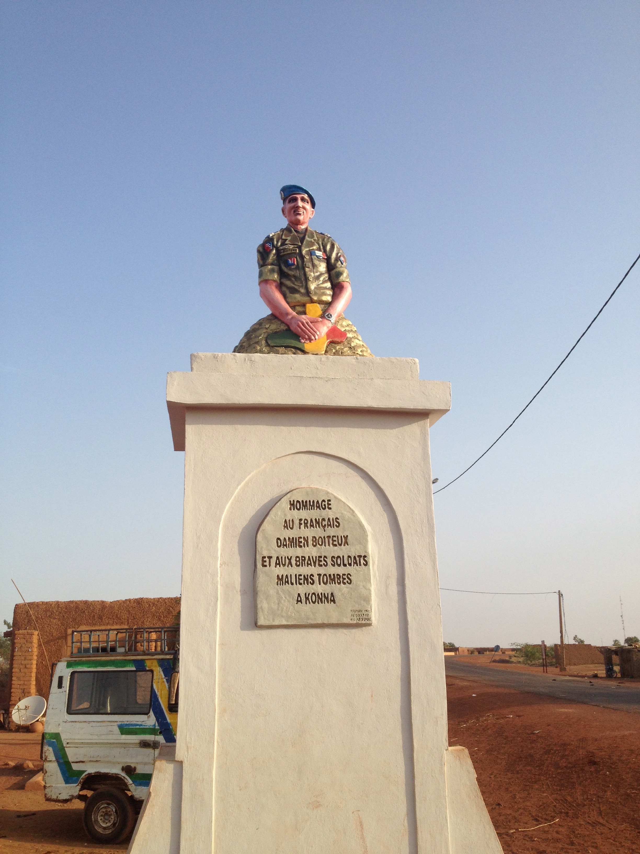 A statue outside the town of Konna commemorates Damien Boiteux, the first French solder killed in Operation Serval, in January 2013. Image by Joshua Hammer. Mali, 2014. Media file: img_2299.jpg