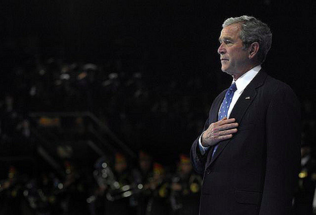 President George W. Bush places his hand on his heart while the national anthem plays during the Armed Forces Full Honor Farewell to President George W. Bush on Fort Myer, Va., Jan. 6, 2009. CC BY 2.0. United States, 2009. President George W. Bush places his hand on his heart while the national anthem plays during the Armed Forces Full Honor Farewell to President George W. Bush on Fort Myer, Va., Jan. 6, 2009. CC BY 2.0. United States, 2009.