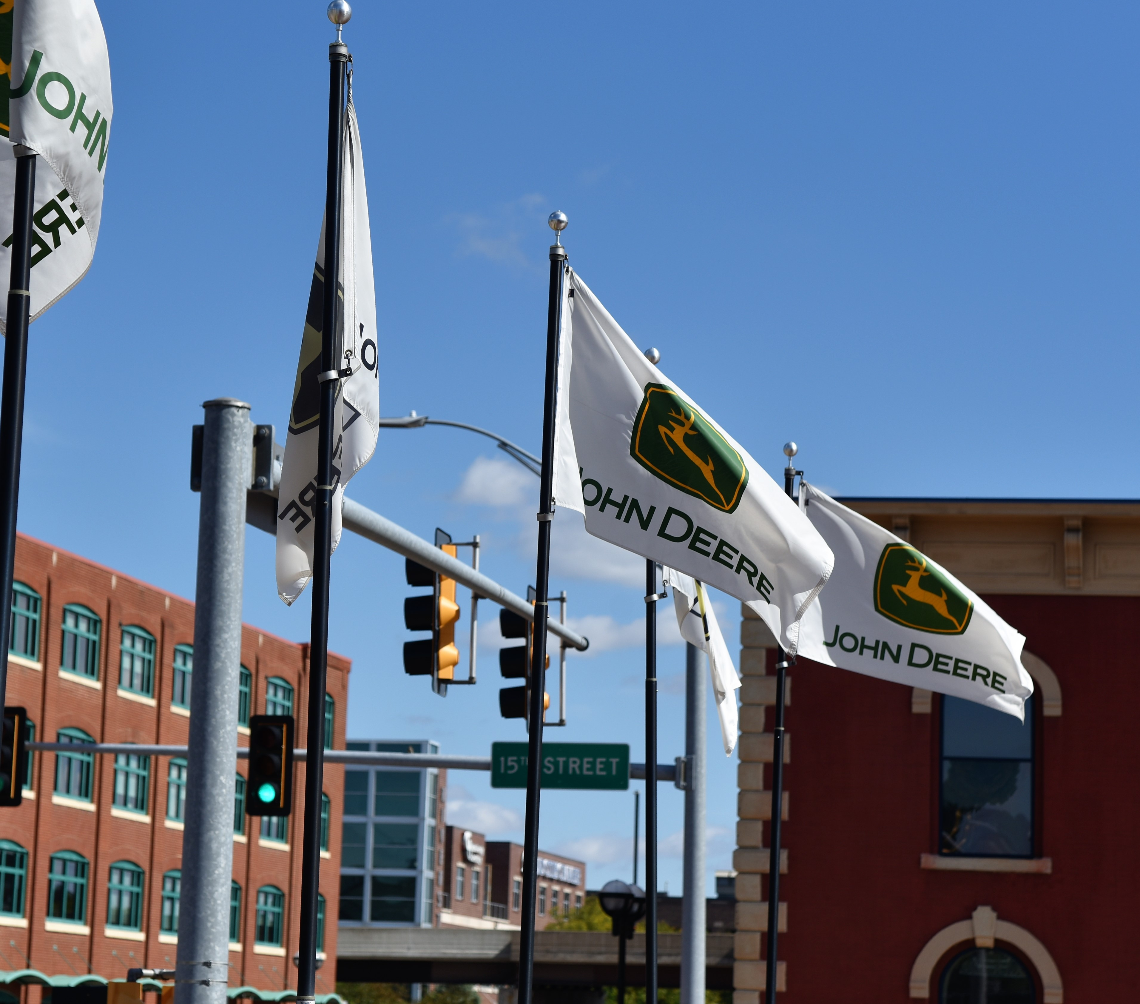 September 2018, Moline, IL, John Deere Flags waving in front of the Pavilion. Image by Florida Chuck/Shutterstock. United States, 2018. September 2018, Moline, IL, John Deere Flags waving in front of the Pavilion. Image by Florida Chuck/Shutterstock. United States, 2018.