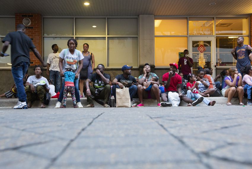 Migrants at a resource center in downtown San Antonio are given food and a bag with basic hygiene products, then escorted to a nearby shelter to spend the night. Image by Marjorie Kamys Cotera. United States, 2019. Migrants at a resource center in downtown San Antonio are given food and a bag with basic hygiene products, then escorted to a nearby shelter to spend the night. Image by Marjorie Kamys Cotera. United States, 2019.