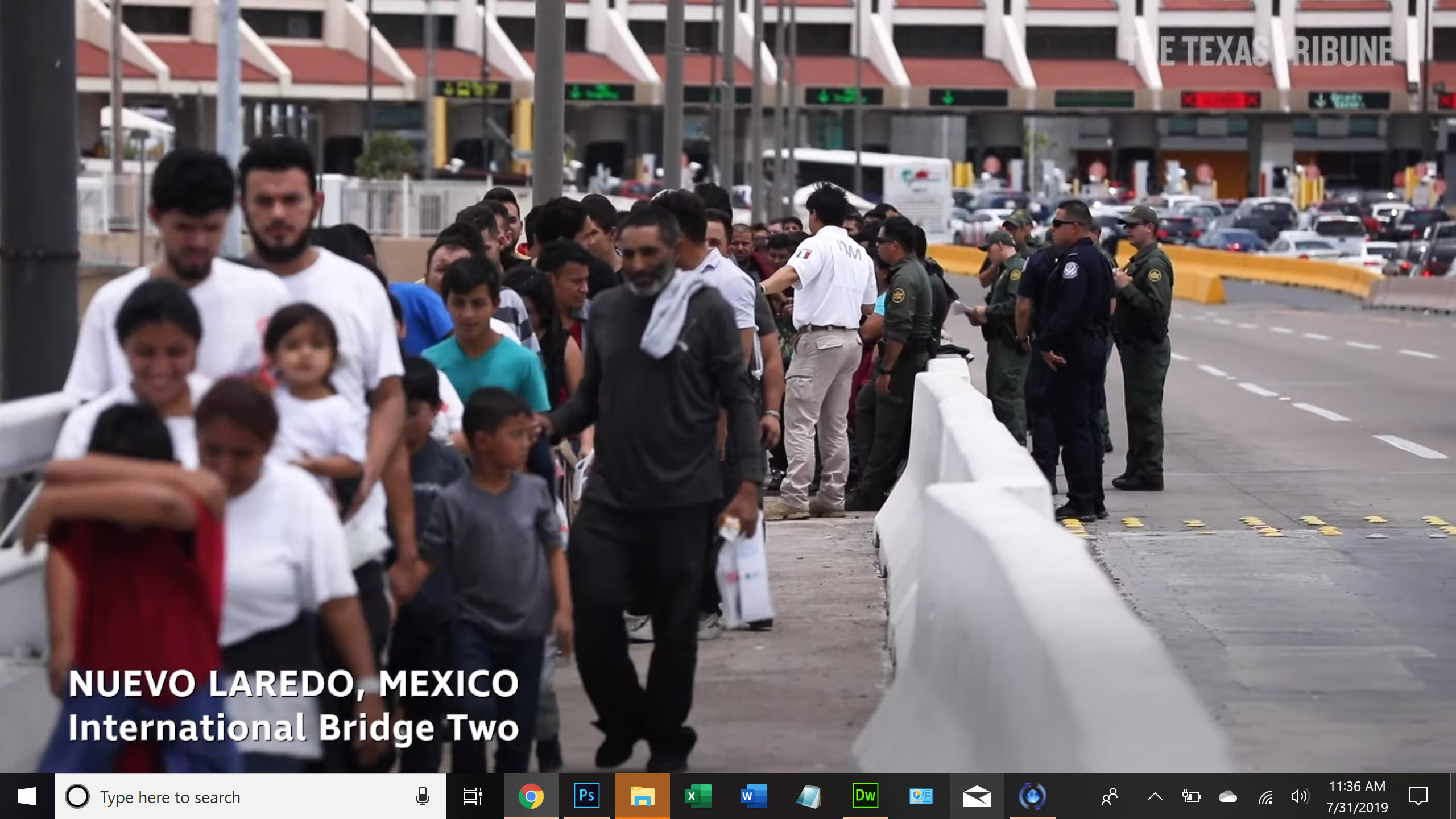 Migrants wait on the international bridge to the United States in Nuevo Laredo. Image by the Texas Tribune. Mexico, 2019. Migrants wait on the international bridge to the United States in Nuevo Laredo. Image by the Texas Tribune. Mexico, 2019.