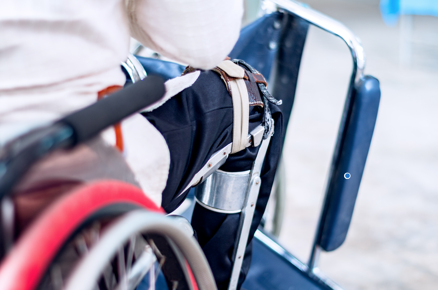 A man sitting on the wheelchair with an old polio knee brace, closeup view. Image by Ruchuda Boonplien / Shutterstock. Undated. A man sitting on the wheelchair with an old polio knee brace, closeup view. Image by Ruchuda Boonplien / Shutterstock. Undated.