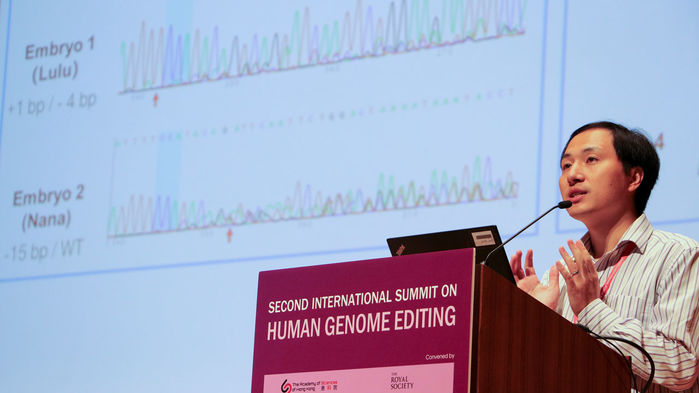 He Jiankui presented a slide at a Hong Kong, China, genome-editing summit that showed DNA sequences from the edited CCR5 genes in the twin girls. Image courtesy of National Academies/Flickr. China, 2019. He Jiankui presented a slide at a Hong Kong, China, genome-editing summit that showed DNA sequences from the edited CCR5 genes in the twin girls. Image courtesy of National Academies/Flickr. China, 2019.