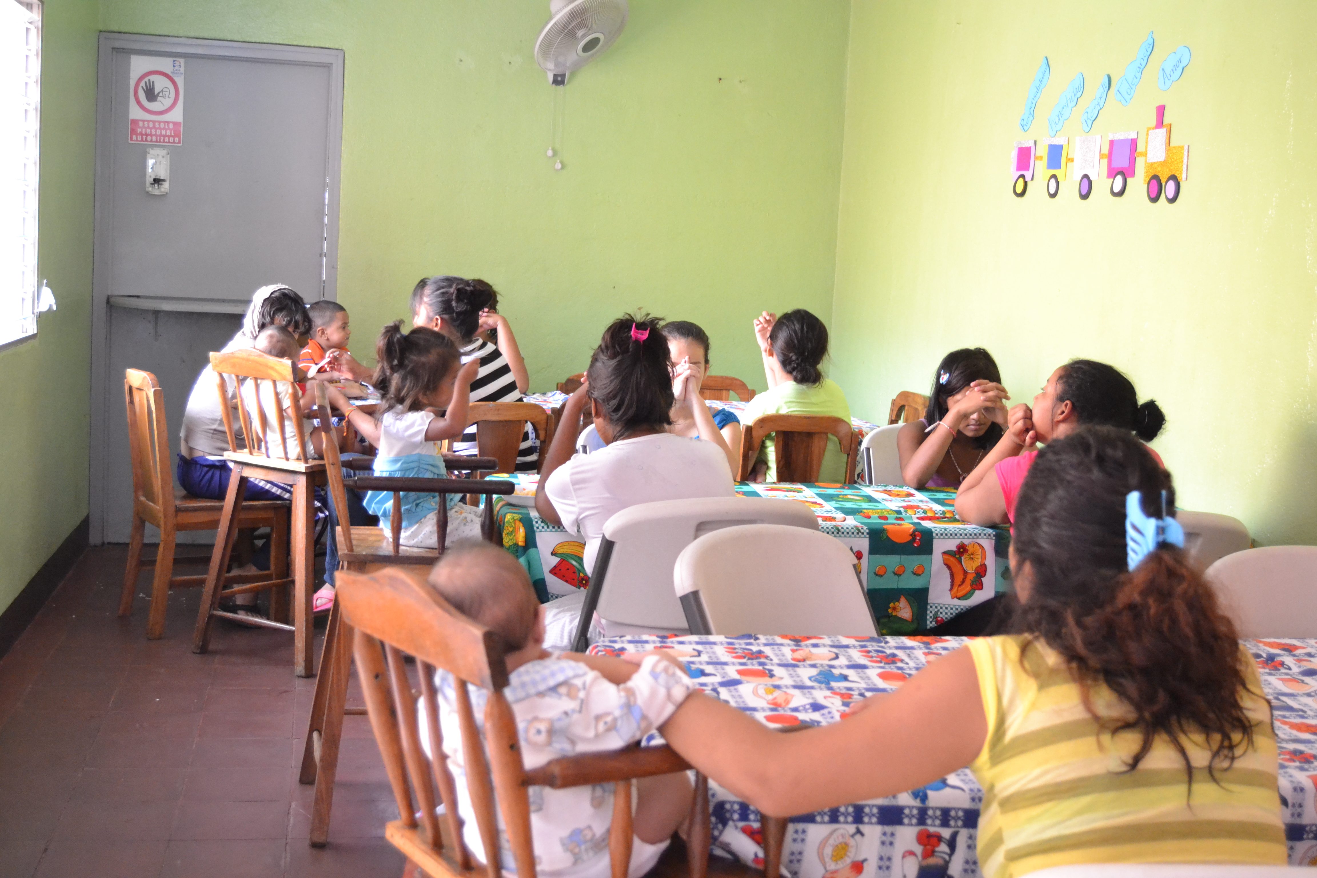 Residents at the Adolescent Mother's home in Managua pray before lunch. Even in this overwhelmingly Catholic country, citizens are beginning to speak out against the abortion ban. Image by Eleanor Klibanoff. Nicaragua, 2013. Media file: dsc_0049.jpg