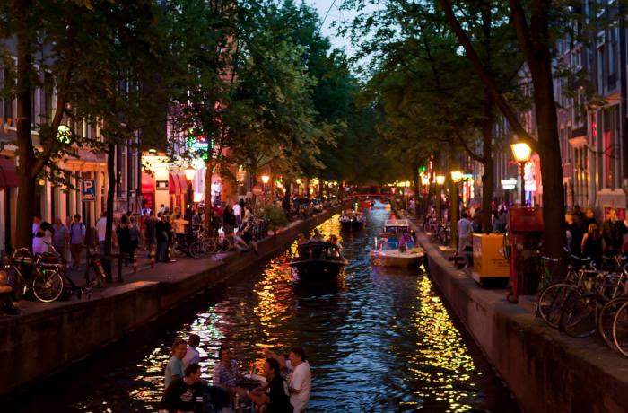 Amsterdam's red light district at dusk. Image by Qiou87 via Creative Commons. Netherlands, 2010. Media file: unnamed.jpg