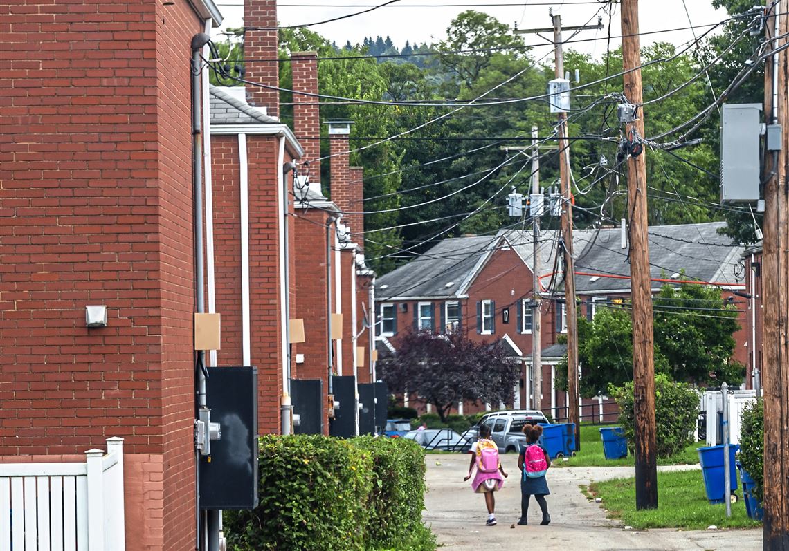 Children walking through the neighborhood. Children walking through the neighborhood.