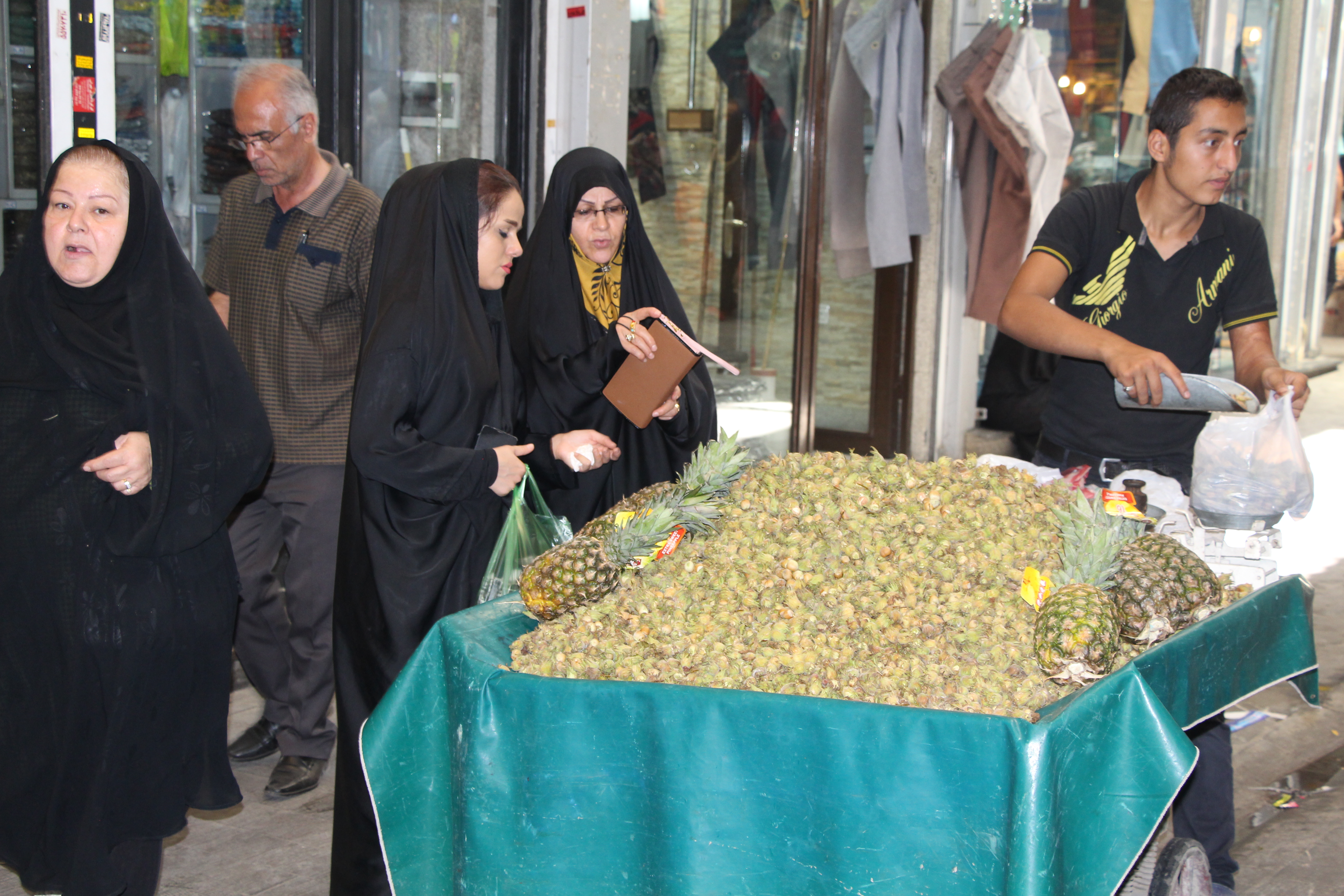 Iranians in the Bazaar are cautiously optimistic about the nuclear agreement. Image by Reese Erlich. Iran, 2015. Media file: nuts_seller.jpg