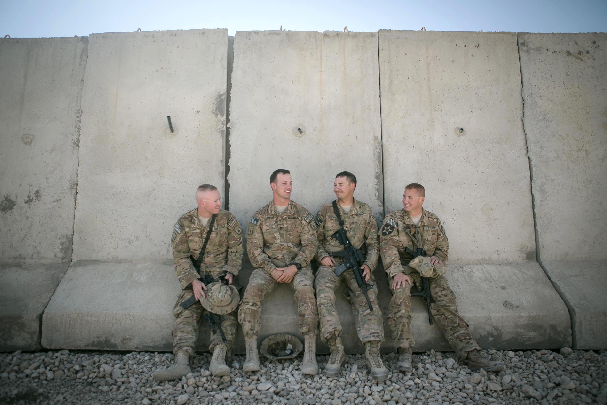 Spc. Aaron Burns of Manitowoc (from left), Staff Sgt. Anthony Steinhoff of Sun Prairie, Sgt. Justin Kundinger of Gilbert, Minn., and Sgt. Shawn Tilly of Green Bay all spent a year in Afghanistan from 2012-2013 and are back again with the Wisconsin National Guard 829th Engineer Co. at Camp Marmal in Mazar-i-Sharif, Afghanistan. Image by Meghan Dhaliwal. Afghanistan, 2014. Media file: afghanagain_1of1.jpg