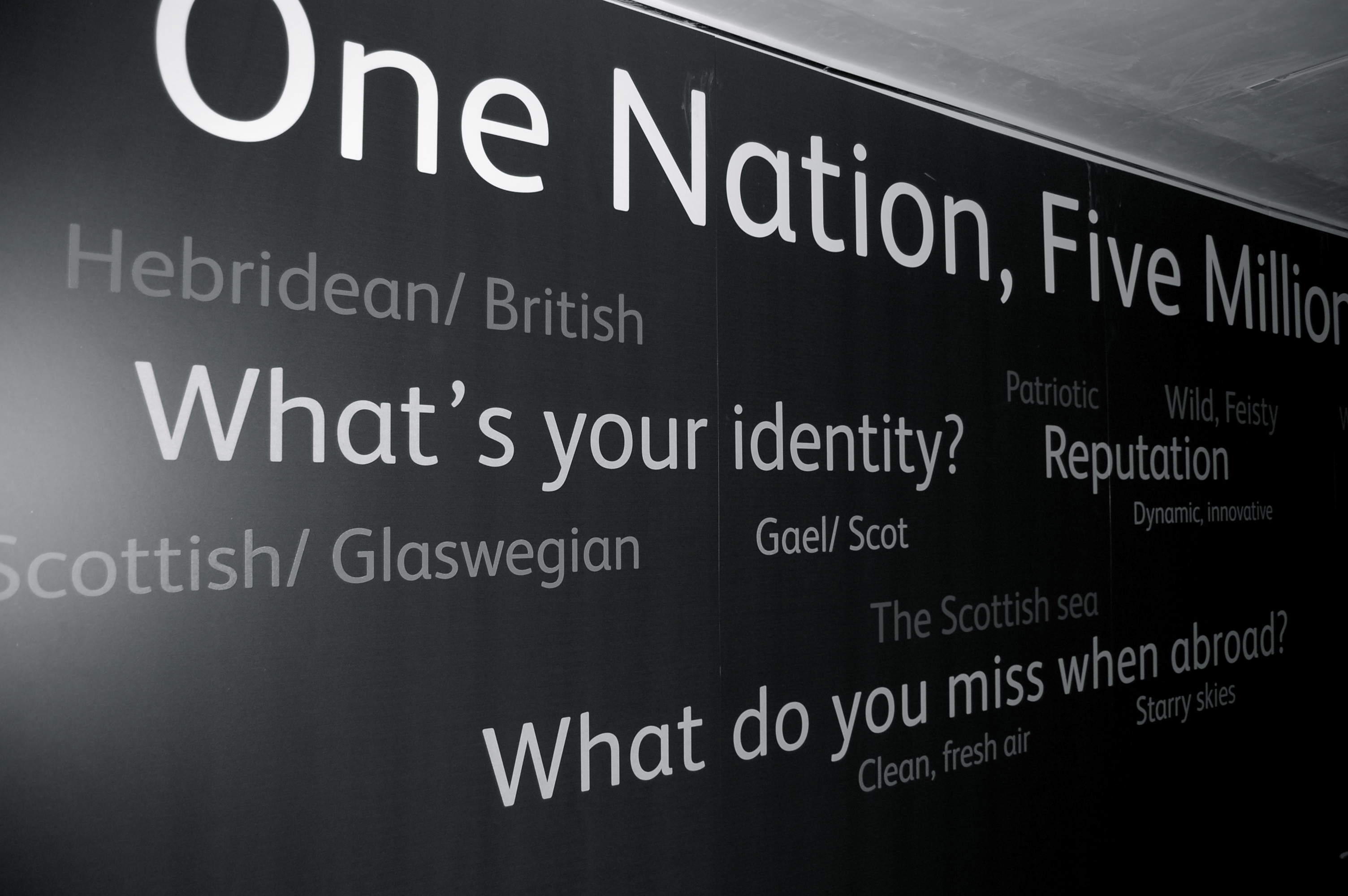Who are the Scots? Results from a national identity survey line the walls inside the National Museum of Scotland in Edinburgh. Image by Henry Molski. Scotland, 2013. Media file: feature_photo.jpg