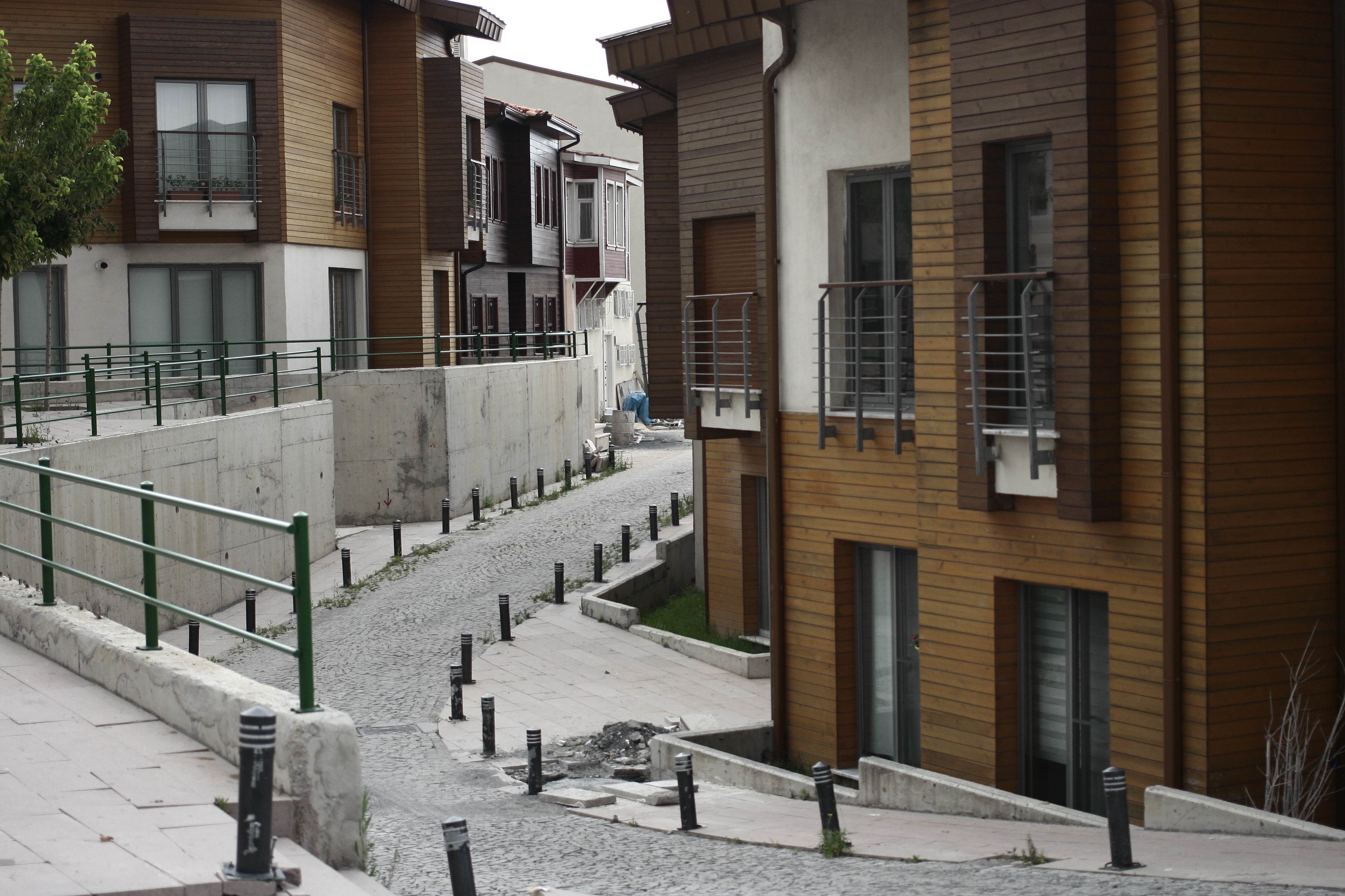 This is the historically renewed area of Sulukule made possible by recent legislation. The area is still under construction. Image by Paul Short. Istanbul, Turkey 2014.