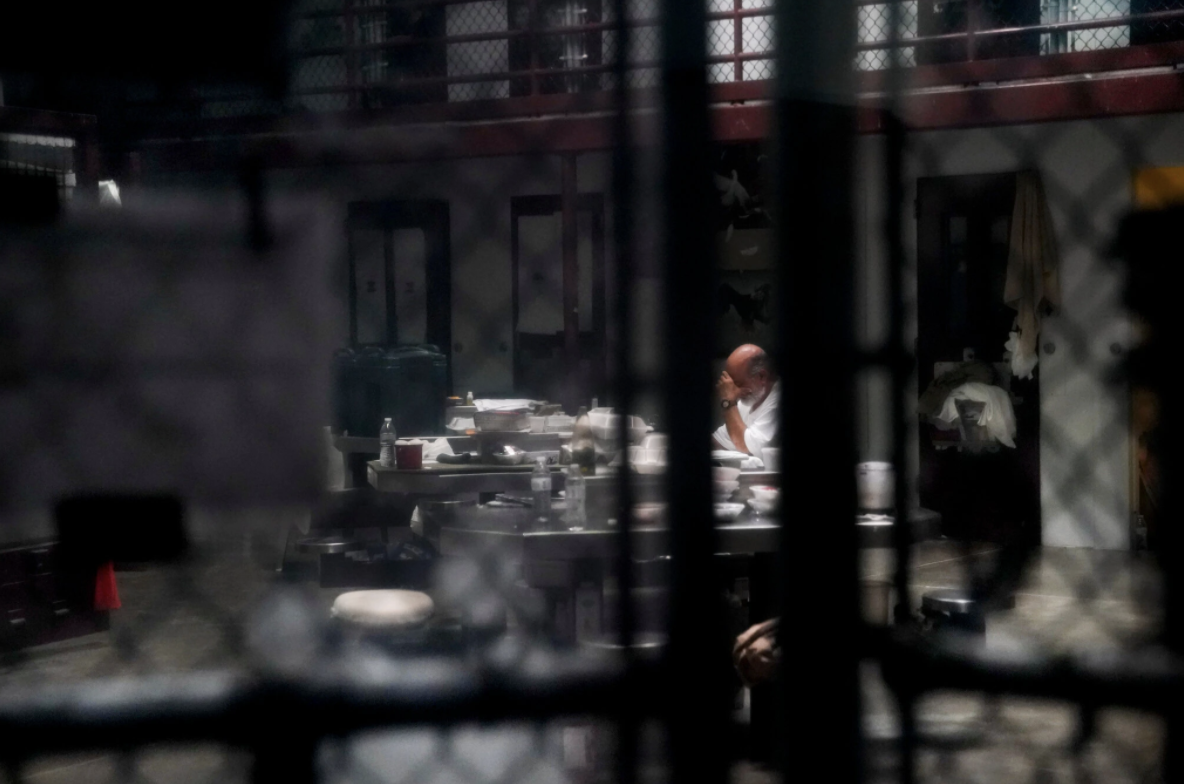 A detainee at Guantánamo Bay in 2019. This year, court activity there has slowed once again. Image by Doug Mills/The New York Times. United States, 2019. A detainee at Guantánamo Bay in 2019. This year, court activity there has slowed once again. Image by Doug Mills/The New York Times. United States, 2019.