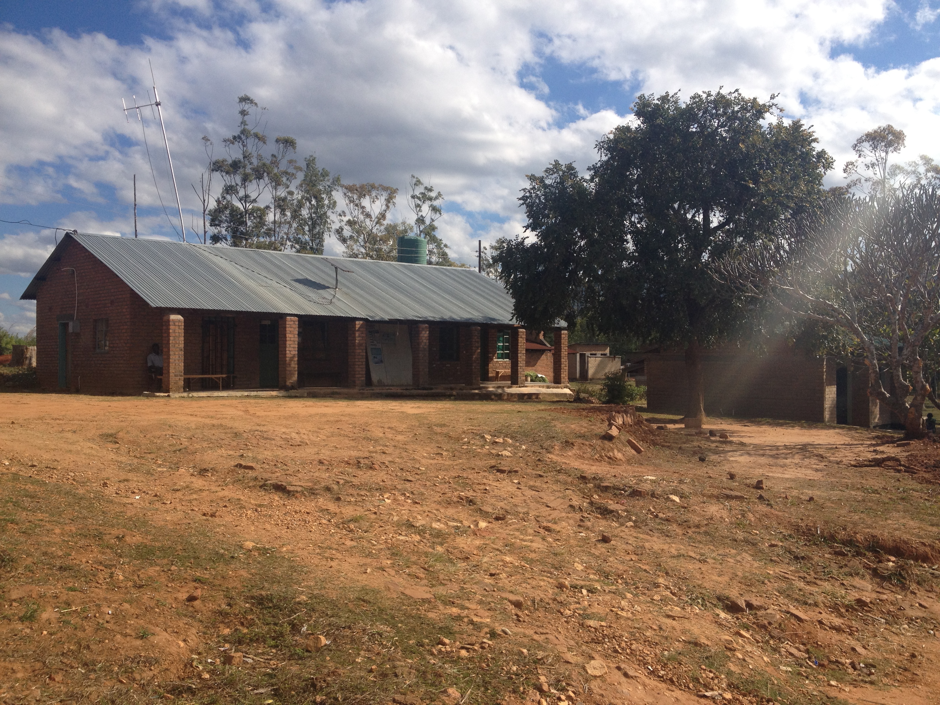 Matandani Health Center, a mission clinic, sees few patients in comparison to the busy government hospital five miles down the road. While patients are charged for medicines and consultation at Matandani, care at the government facility is free. Image by Luke Messac. Malawi, 2013. Media file: luke_messac_photo_feature.jpg