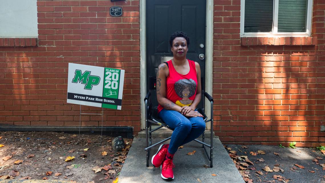 Yolanda Ames sits outside her Grier Heights apartment Wednesday, August 5, 2020. Ames, who cannot afford the internet, is among half of households in her neighborhood in Charlotte with no internet subscription. Image by Jessica Koscielniak. United States, 2020. Yolanda Ames sits outside her Grier Heights apartment Wednesday, August 5, 2020. Ames, who cannot afford the internet, is among half of households in her neighborhood in Charlotte with no internet subscription. Image by Jessica Koscielniak. United States, 2020.
