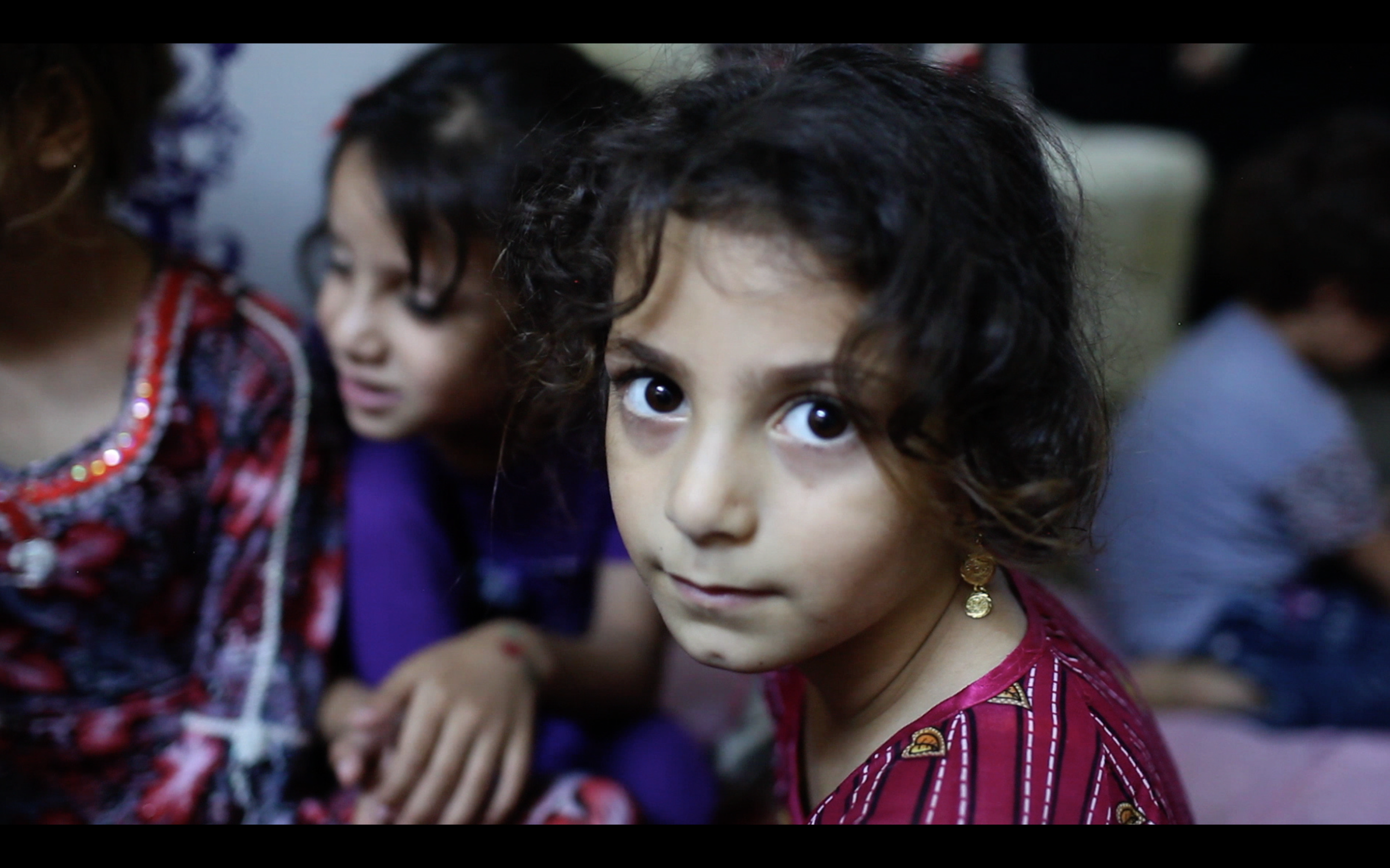 A Turkmen girl who escaped Amerli takes refuge in Kirkuk. Image by Sebastian Meyer. Iraq, 2014. Media file: screen_shot.png