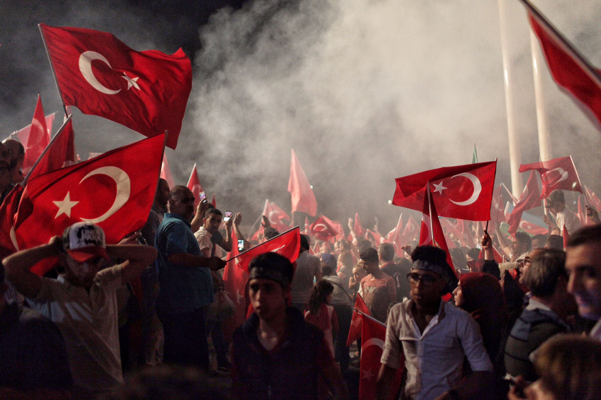 Supporters of Turkish President Recep Tayyip Erdogan in Istanbul’s Taksim Square. Image by Kursat Bayhan/Getty Images. Turkey, 2016. Supporters of Turkish President Recep Tayyip Erdogan in Istanbul’s Taksim Square, Image by Kursat Bayhan/Getty Images. Turkey, 2016.