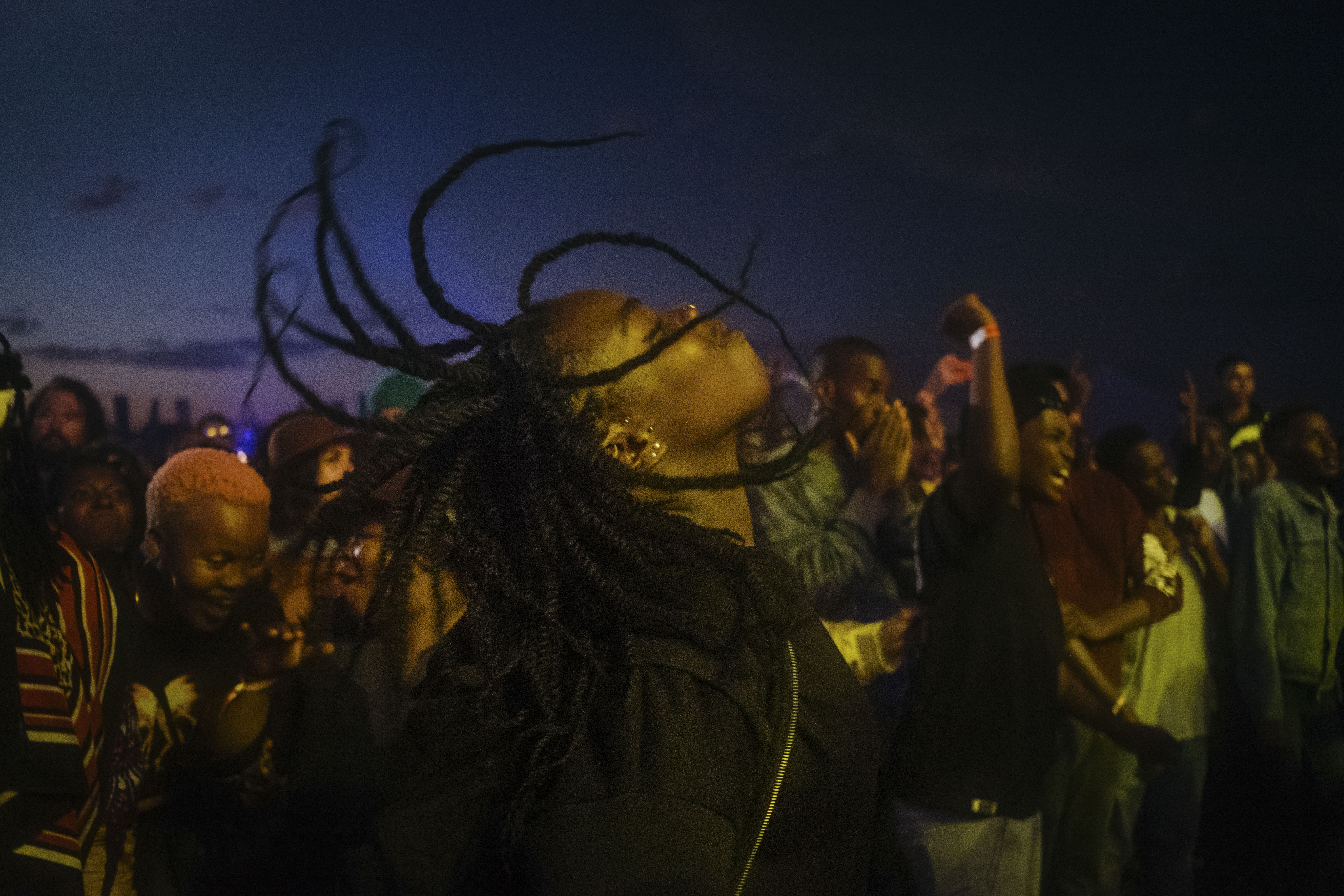 A music fan dances in a mosh pit at the African debut event of the Afropunk music festival hosted at Constitution Hill in Johannesburg. Image by Melissa Bunni Elian. South Africa, 2017. A music fan dances in a mosh pit at the African debut event of the Afropunk music festival hosted at Constitution Hill in Johannesburg. Image by Melissa Bunni Elian. South Africa, 2017.