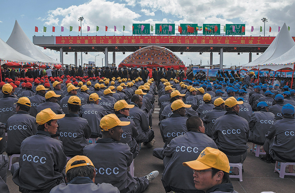 Ethiopian and Chinese workers from the China Communication Construction Company attending Chinese Premier Li Keqiang’s visit to the site of the Addis Ababa–Adama toll road, May 2, 2014. Media file: johnson_1-092514.jpg