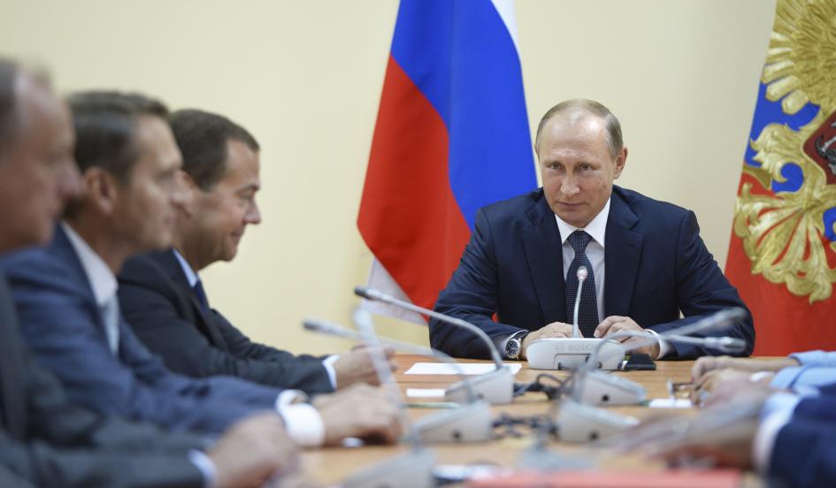 Russia's President Vladimir Putin chairs a meeting with members of the Security Council in Sevastopol, Crimea, August 19. While Putin says he'd like to restore better relations with the West, he still has the assets to throw Europe and the world into a Cold War-style confrontation at any time, the author writes. Image by REUTERS/ALEXEI NIKOLSKY/RIA NOVOSTI/KREMLIN. Media file: 0904putin01.jpg