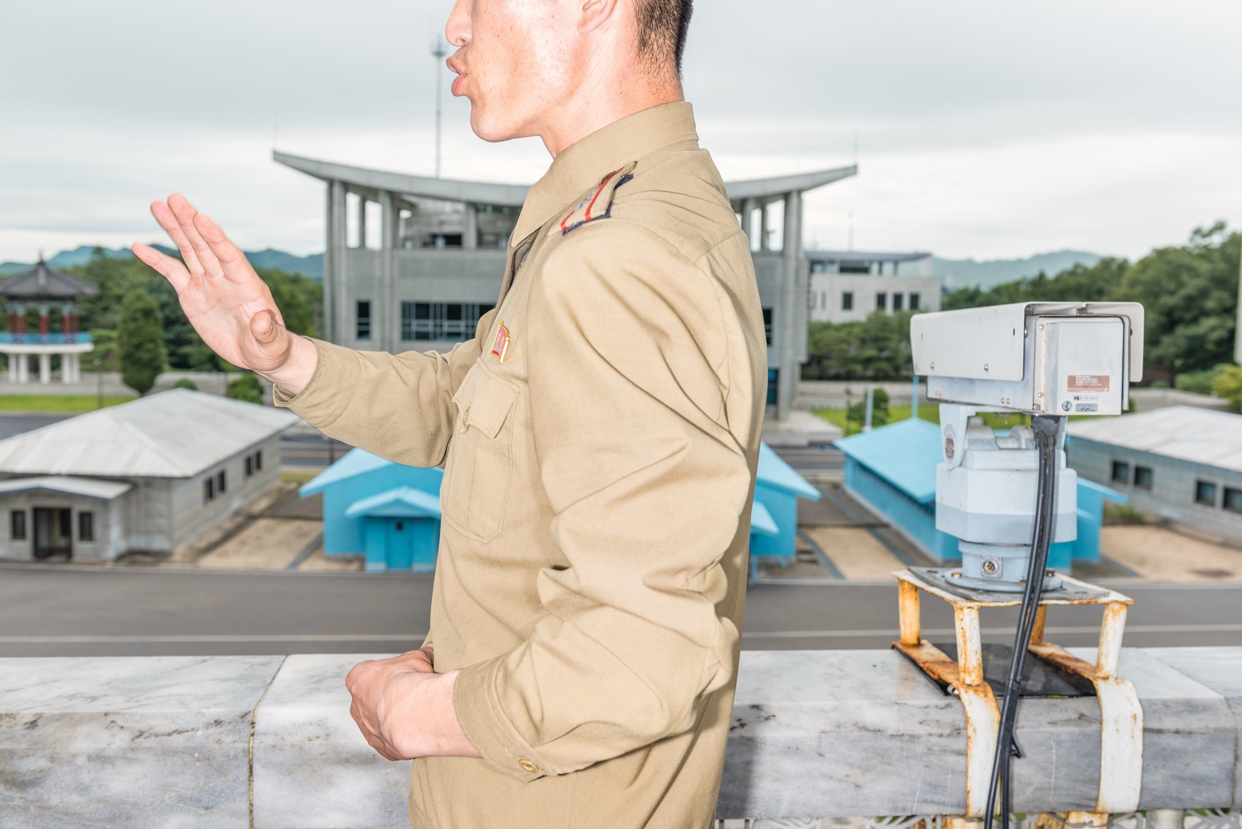 A military officer at the D.M.Z. This summer, the prospect of a nuclear confrontation between the United States and North Korea, the most hermetic power on the globe, entered a realm of psychological calculation reminiscent of the Cold War. Image by Max Pinckers/The New Yorker. North Korea, 2017. A military officer at the D.M.Z. This summer, the prospect of a nuclear confrontation between the United States and North Korea, the most hermetic power on the globe, entered a realm of psychological calculation reminiscent of the Cold War. Image by Max Pinckers/The New Yorker. North Korea, 2017.
