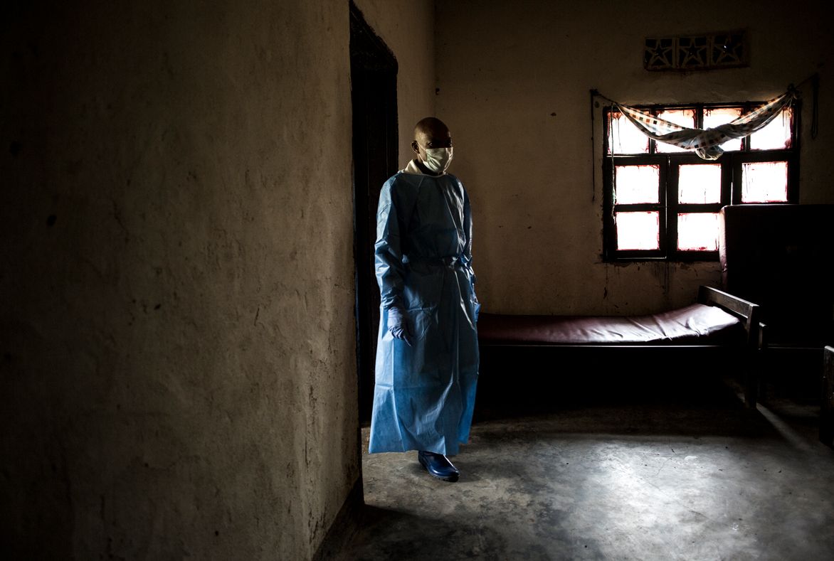 Health workers in a war-weary region are confronted with Ebola, a deadly virus that has claimed more than 2,000 lives. Image by John Wessels. Democratic Republic of Congo, 2019. Health workers in a war-weary region are confronted with Ebola, a deadly virus that has claimed more than 2,000 lives. Image by John Wessels. Democratic Republic of Congo, 2019.