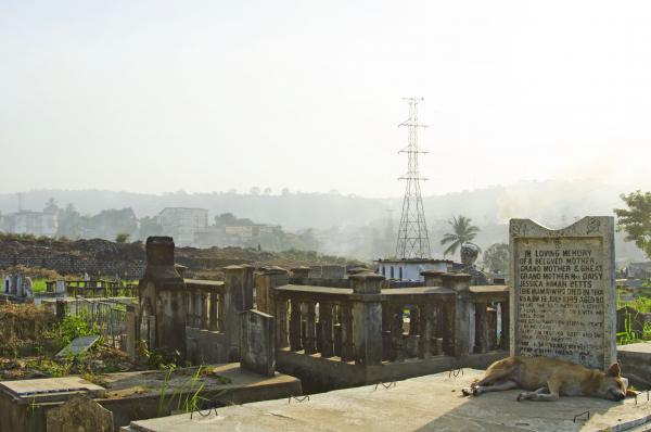 King Tom cemetery, the largest graveyard in Freetown, Sierra Leone, has expanded three times since the start of the Ebola outbreak. Image by Amy Maxmen. Sierra Leone, 2014. King Tom Cemetary