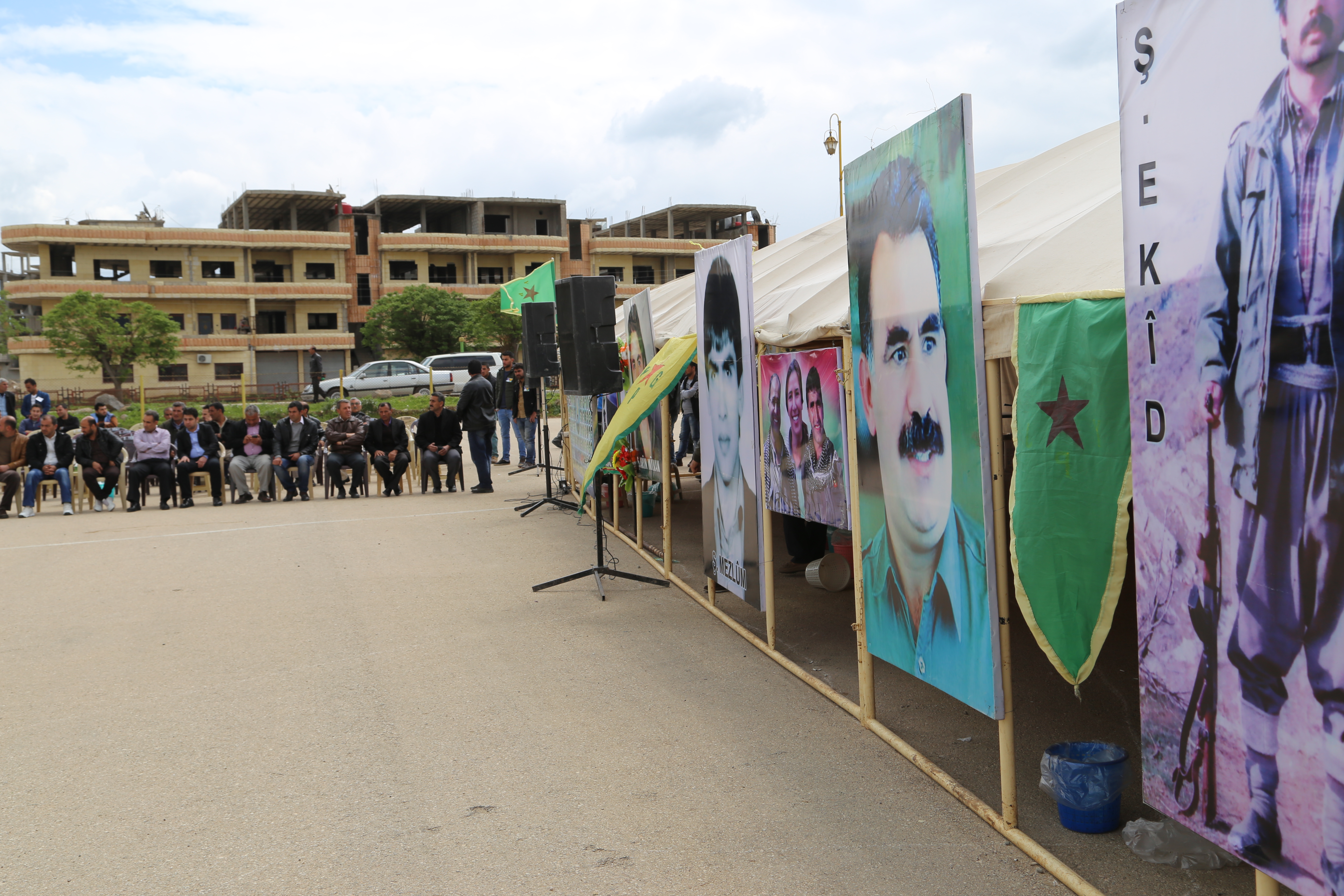 YPG soldiers and civilians attend a funeral in Derik. Image by Omar Abdulkhader. Syria, 2015.