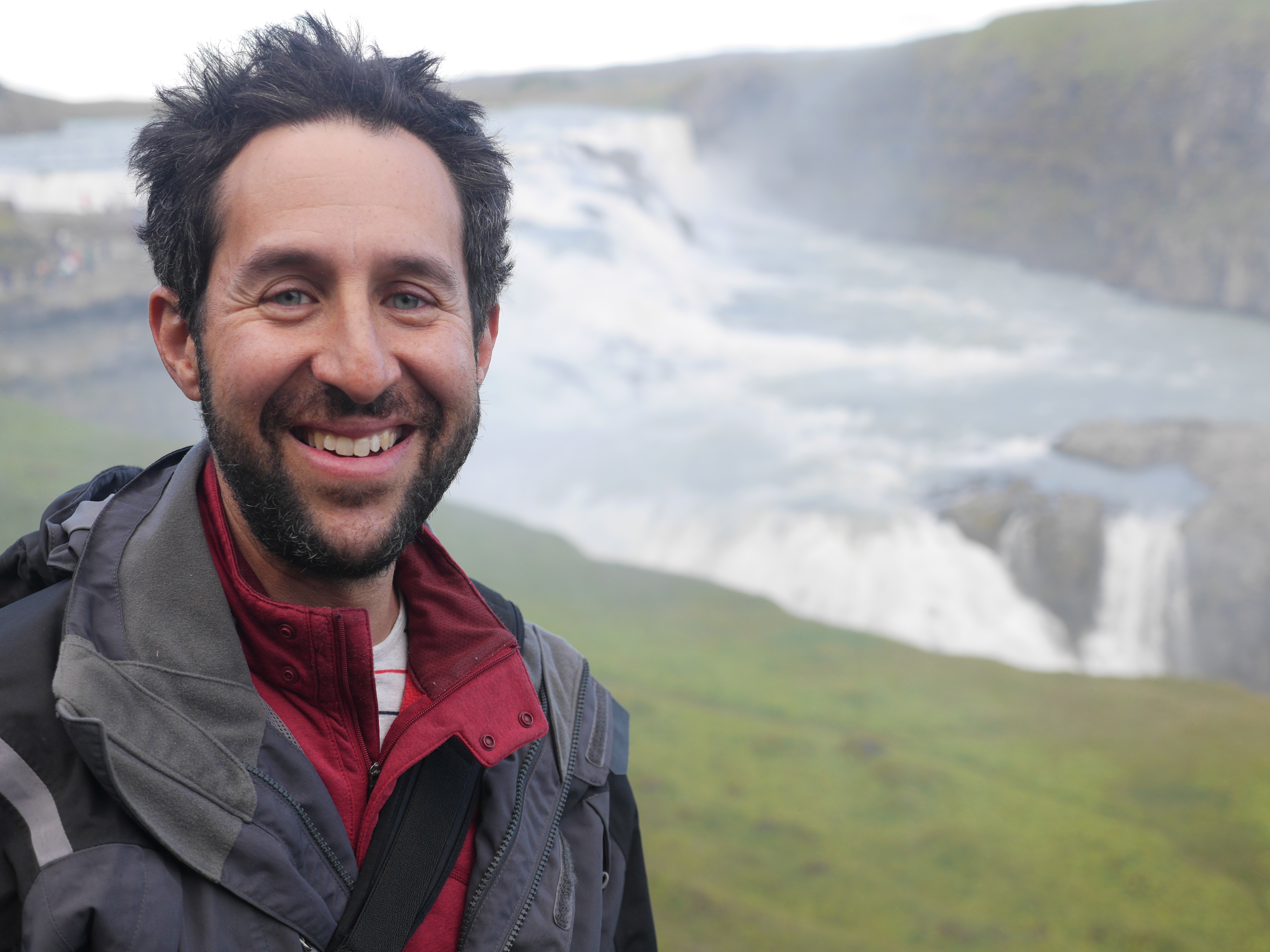 Eli Kintisch at Gullfoss waterfall in Iceland. Image by Lauren Weinstein. Iceland, 2016.