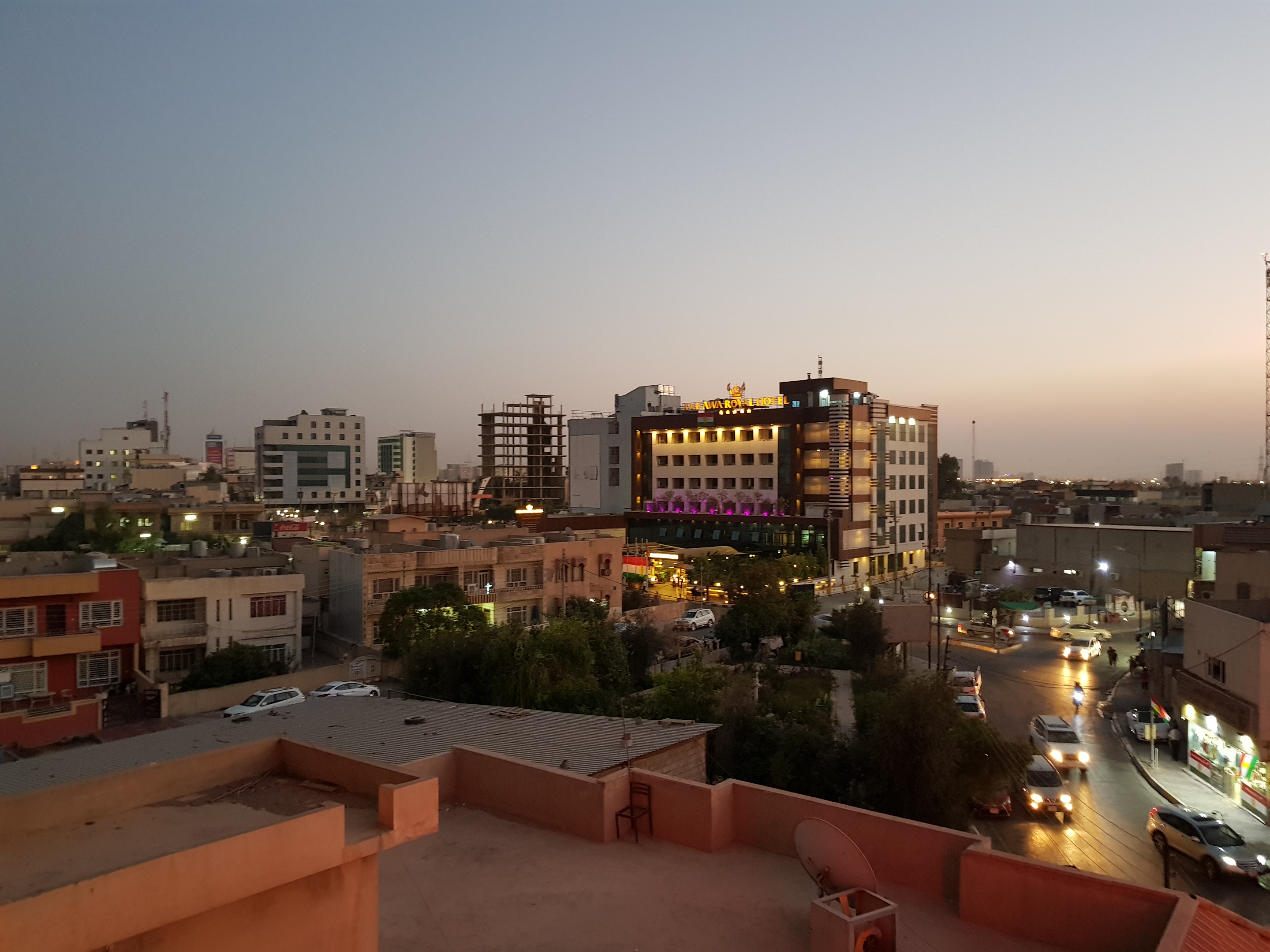 The Ankawa neighborhood in Erbil, during sunset one evening ahead of an independence referendum. Image by Kenneth R. Rosen. Iraq, 2017. The Ankawa neighborhood in Erbil, during sunset one evening ahead of an independence referendum. Image by Kenneth R. Rosen. Iraq, 2017.