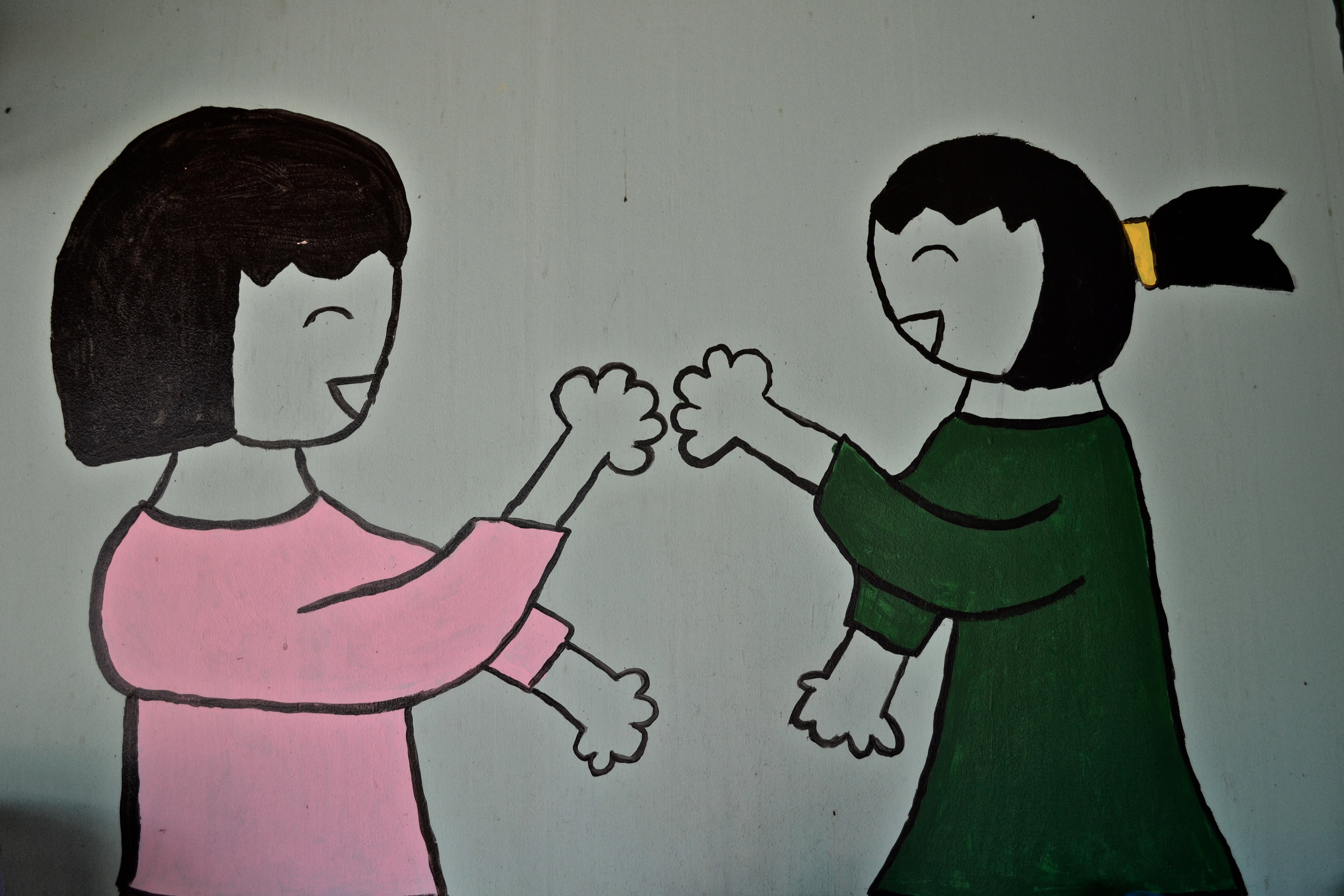 A mural at the World Hope assessment center depicts the restoration found through counseling and community. Image by Melisa Goss. Cambodia, 2013.