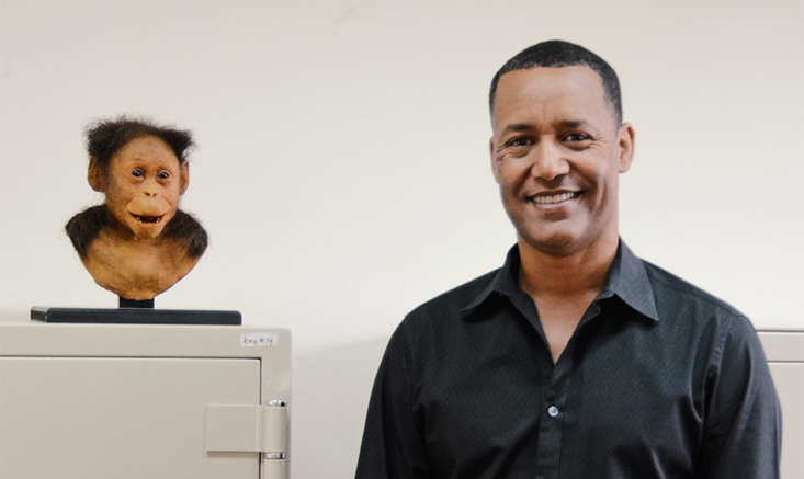 Paleoanthropologist Zeresenay Alemseged beside his discovery, a 3.3 million year old child, an early species in humankind’s lineage. “When you realize that you, as an individual, are part of a very long line, you begin to take it personally,” he said, “you really are afraid to cut off that line.” Image by Amy Maxmen. Ethiopia, 2014. Media file: 4344_3c7417b8df0daf23f39f445e740c7a43.png