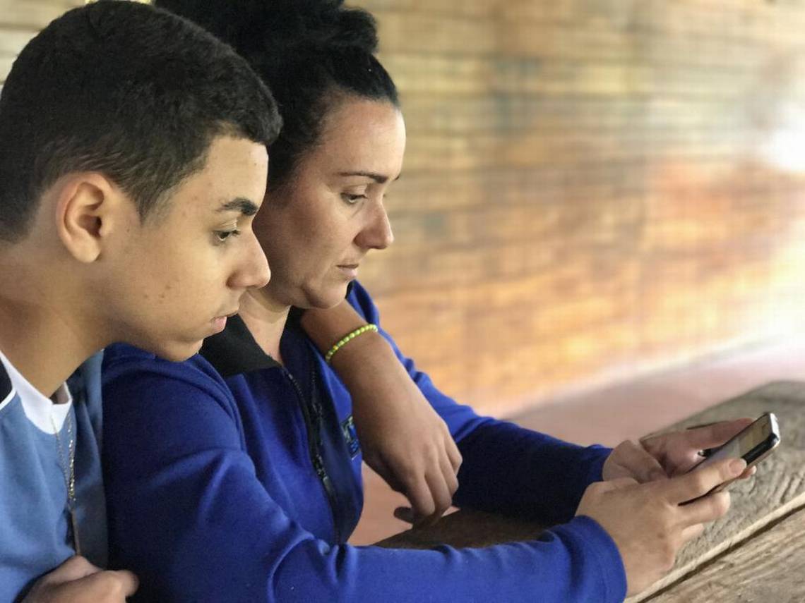 Addis Torres, at the shelter with her husband and their 13-year-old son, was devastated by the news. Image by Mario J. Penton. Panama, 2017. Addis Torres, at the shelter with her husband and their 13-year-old son, was devastated by the news. Image by Mario J. Penton. Panama, 2017.