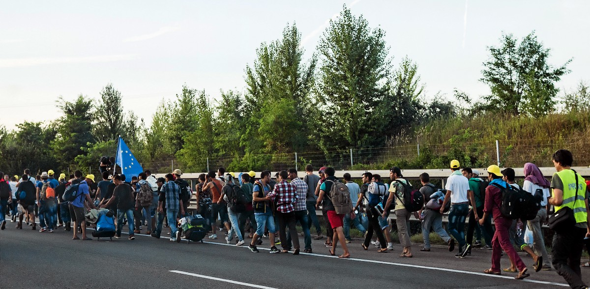 Refugees and migrants head north through Hungary toward Austria in September 2015. Image by Joachim Seidler. Hungary, 2015. Refugees and migrants head north through Hungary toward Austria in September 2015. Image by Joachim Seidler. Hungary, 2015.