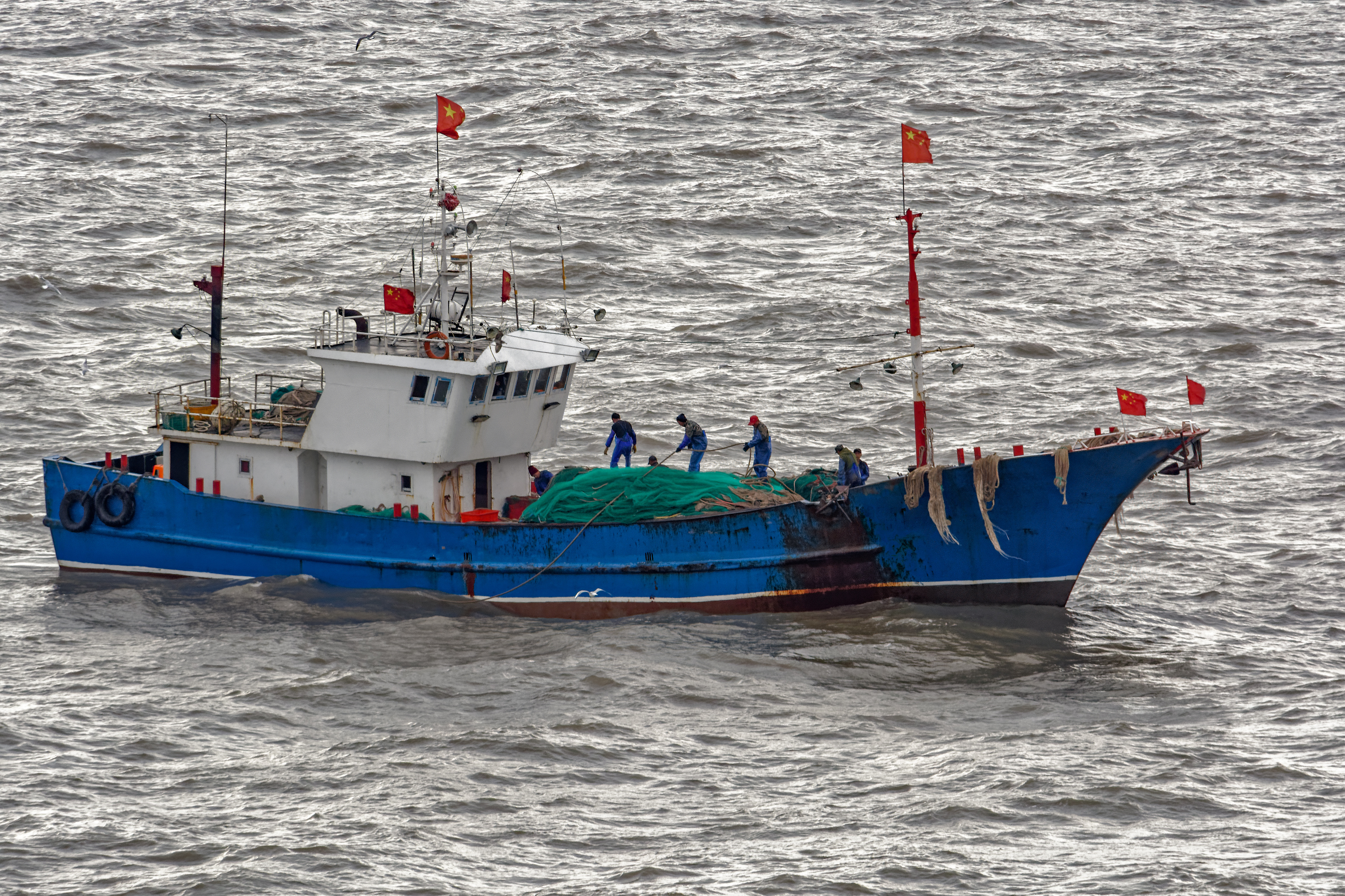 A commercial fishing boat on the South China Sea. Image by Igor Grochev / Shutterstock. A commercial fishing boat on the South China Sea. Image by Igor Grochev / Shutterstock.