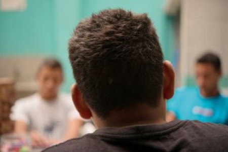"Emilio" says he still wants to reach the United States, even after being held hostage by a smuggler. Guatemala, 2014. Image by Billy Prem. Media file: wr20140714-21migrant-orphan.jpg