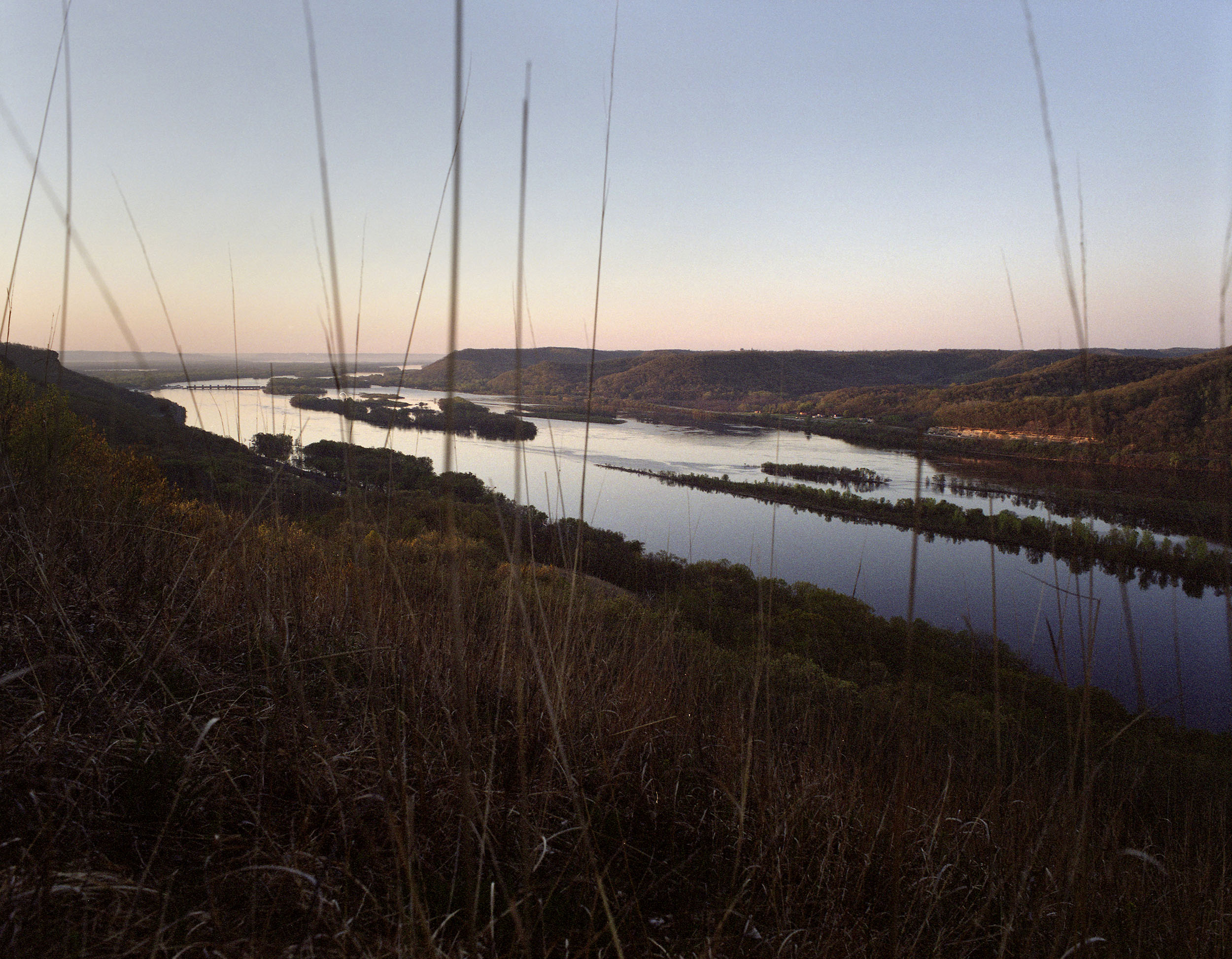 Trempealeau, Wisconsin - The Mississippi River. Agricultural fertilizer from 31 states wash into the Mississippi River. Like a topologic funnel it directs 41% of America’s water toward the delta, and America’s most productive fishing grounds. Image by Spike Johnson. United States, 2019. Trempealeau, Wisconsin - The Mississippi River. Agricultural fertilizer from 31 states wash into the Mississippi River. Like a topologic funnel it directs 41% of America’s water toward the delta, and America’s most productive fishing grounds. Image by Spike Johnson. United States, 2019.