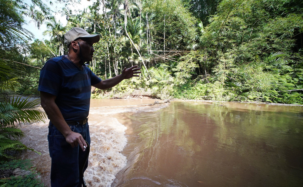 B.J. says the river was calmer the day that Fr. Louis Brouillard tied him to a tree and raped him three times. He says he was bleeding and didn't understand what was happening. Image by Cory Lum. Guam, 2017. B.J. says the river was calmer the day that Fr. Louis Brouillard tied him to a tree and raped him three times. He says he was bleeding and didn't understand what was happening. Image by Cory Lum. Guam, 2017.