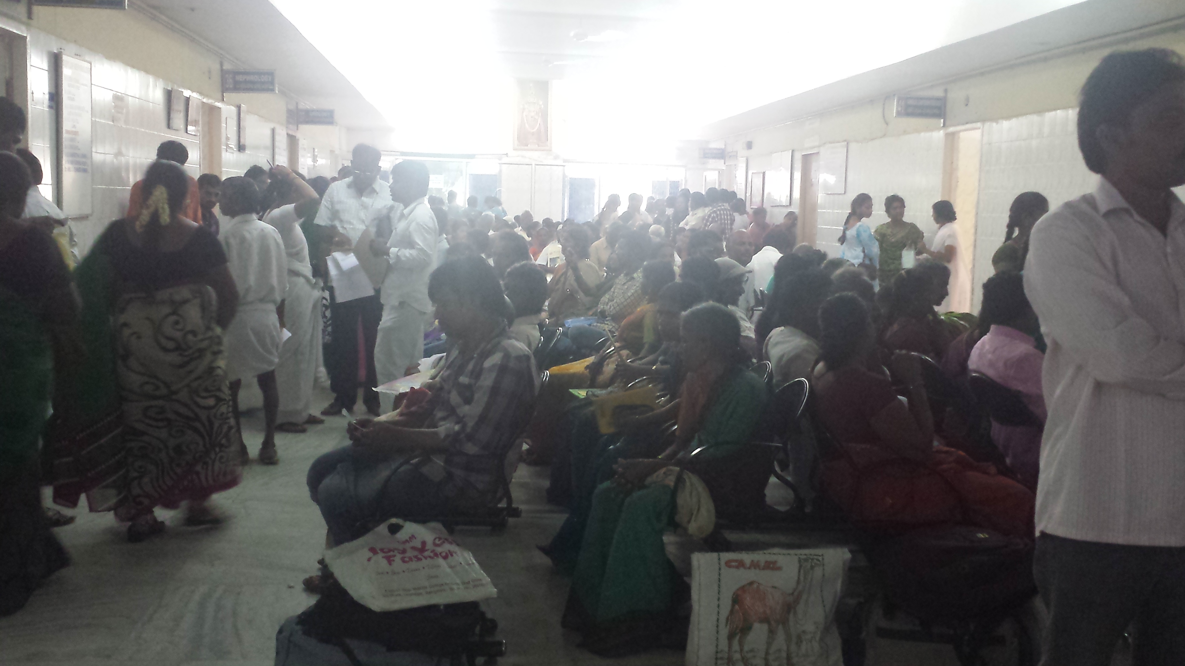 Patients in the waiting area of the outpatient neurology department of the Sri Venkateswara Institute of Medical Sciences. Image by Priya Ramchandra. India, 2015.