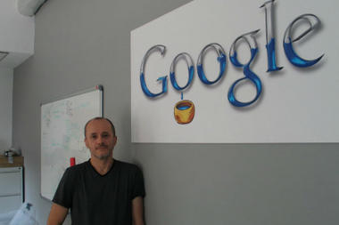 Wojciech Burkot, director of Google's R&D center in Krakow. Mr. Burkot, a high-energy physicist born in Krakow was given permission to open an office anywhere he wanted, but came back home. Burkot cites the area's high stress on education, science and math. Image by Robert Marquand. Poland, 2012. Media file: 10-18-pole_full_380.jpg