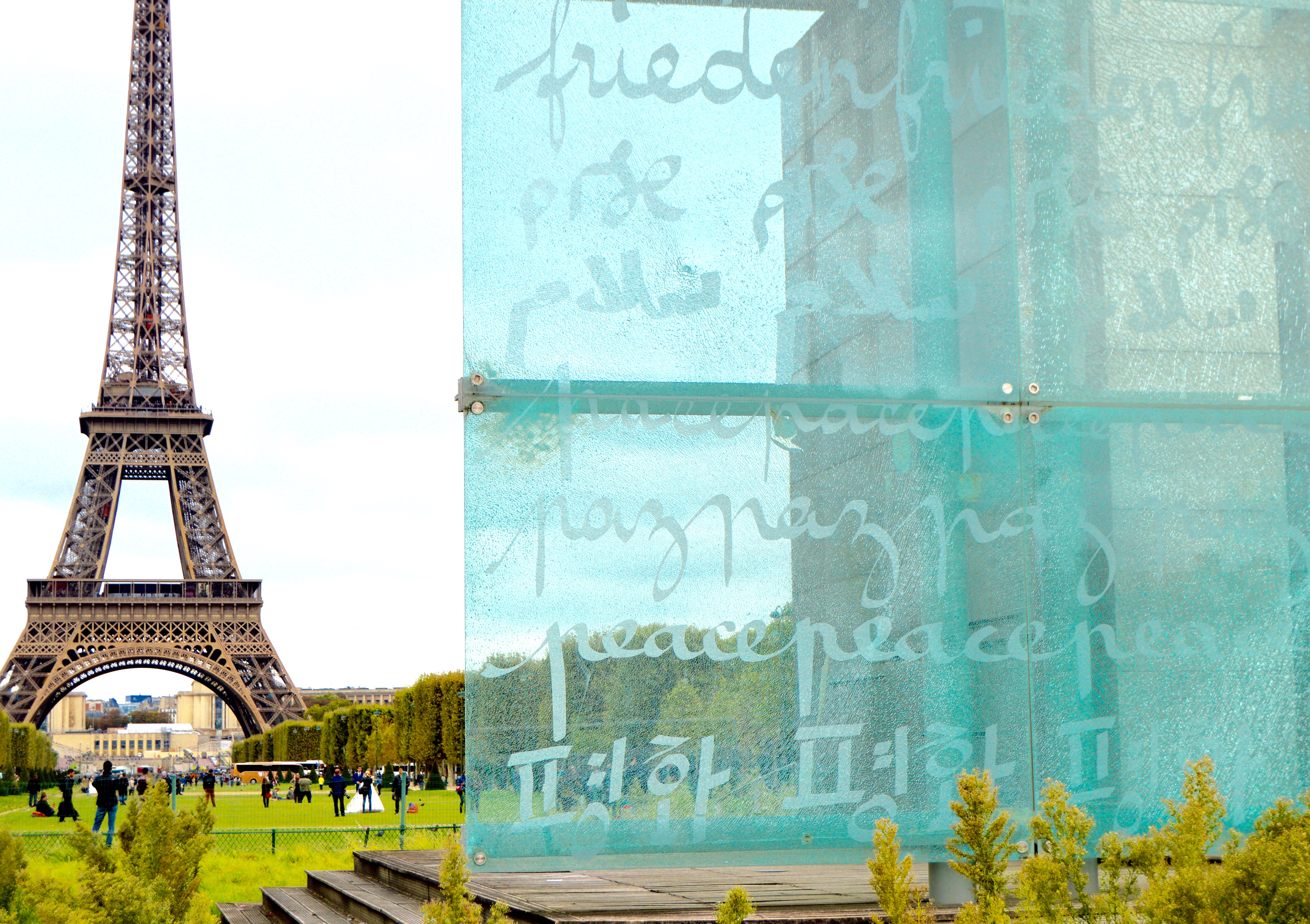 On the Wall of Peace, erected near the base of the Eiffel Tower in 2000, the word ‘peace’ is inscribed in 49 different languages. The monument and its inscriptions are a call for action towards meaningful inclusion and a more peaceful reality. Image by Charlotte Bellomy. France, 2015.