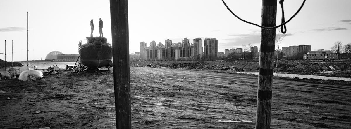 Bychiy Island on the Neva River has long been home to a children's ecological school and student yacht club. It is now being developed into a private, $100 million judo mega-complex, headed by Arkady Rotenberg, President Vladimir Putin's childhood sparring partner. Putin, a black belt in judo, serves as the club's honorary president. Image by Misha Friedman. Russia, 2015.
