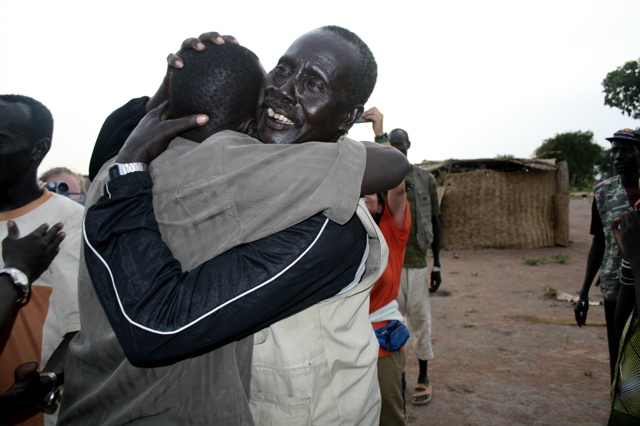 Koor meets his father for the first time in almost 20 years. Photo Credit: Gabriel Bol Deng, H.O.P.E., gaboldeng@yahoo.com 1