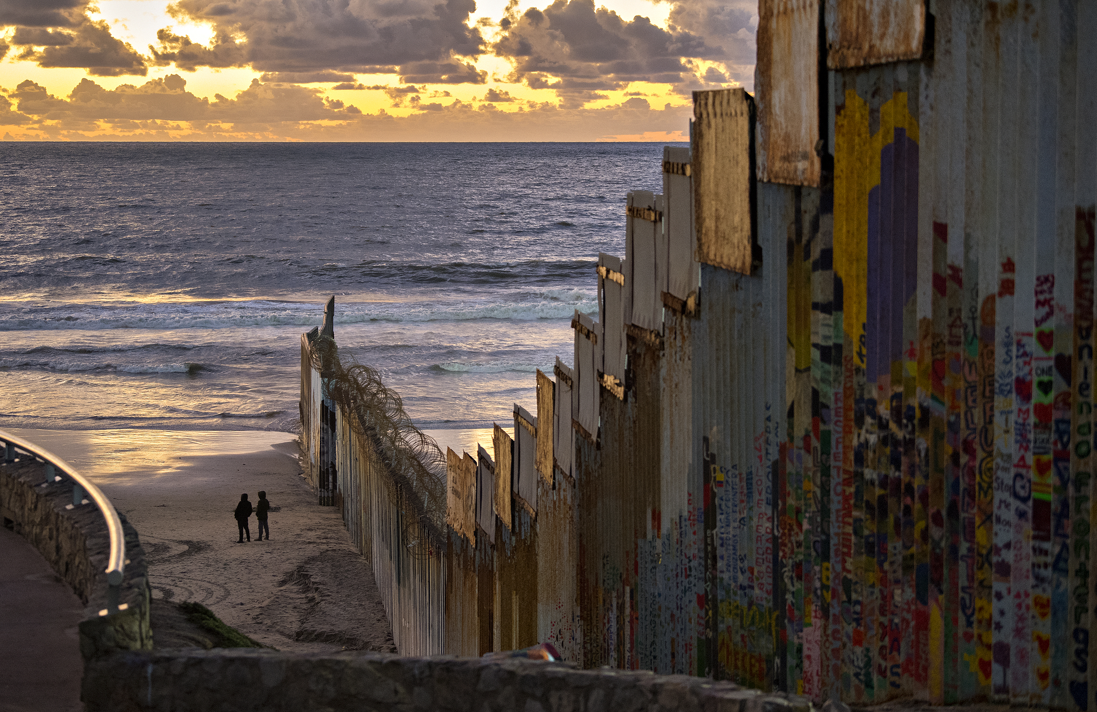 The border wall stops just short of the Pacific Ocean at Playas de Tijuana. Image by Amanda Cowan. Mexico, 2019. The border wall stops just short of the Pacific Ocean at Playas de Tijuana. Image by Amanda Cowan. Mexico, 2019.