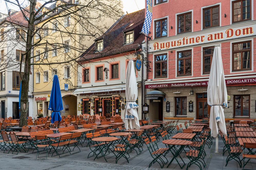 In March, Munich's restaurants and bars stood empty due to the initial coronavirus shutdown. Image by Jazzmany / Shutterstock. Germany, 2020, In March, Munich's restaurants and bars stood empty due to the initial coronavirus shutdown. Image by Jazzmany / Shutterstock. Germany, 2020,