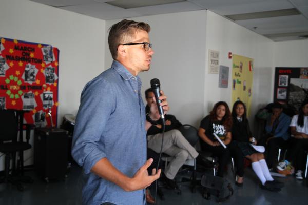 Dominic Bracco speaks at an assembly at Richard Wright Public Charter School for Journalism and Media Arts. Image by Meghan Dhaliwal. Washington, DC, 2013.