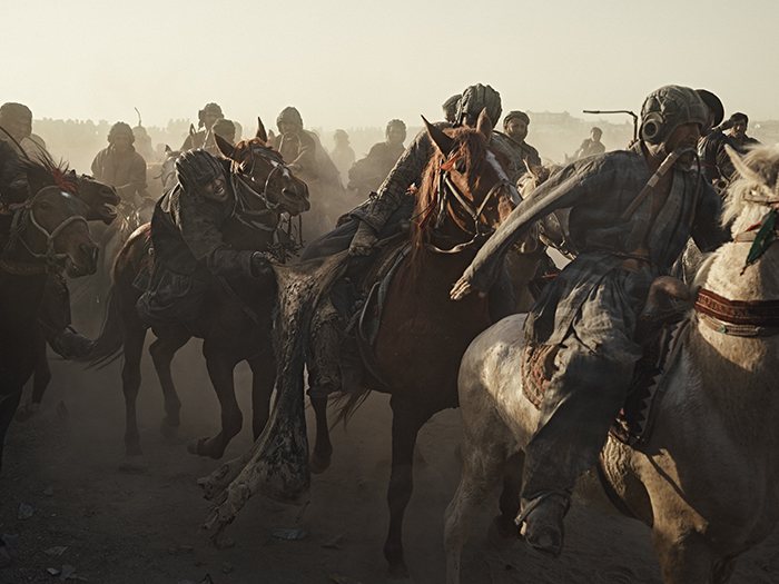 Riders battle for the calf at a buzkashi event in Balkh province, northern Afghanistan. Image by Balazs Gardi. Riders battle for the calf at a buzkashi event in Balkh province, northern Afghanistan. Image by Balazs Gardi.