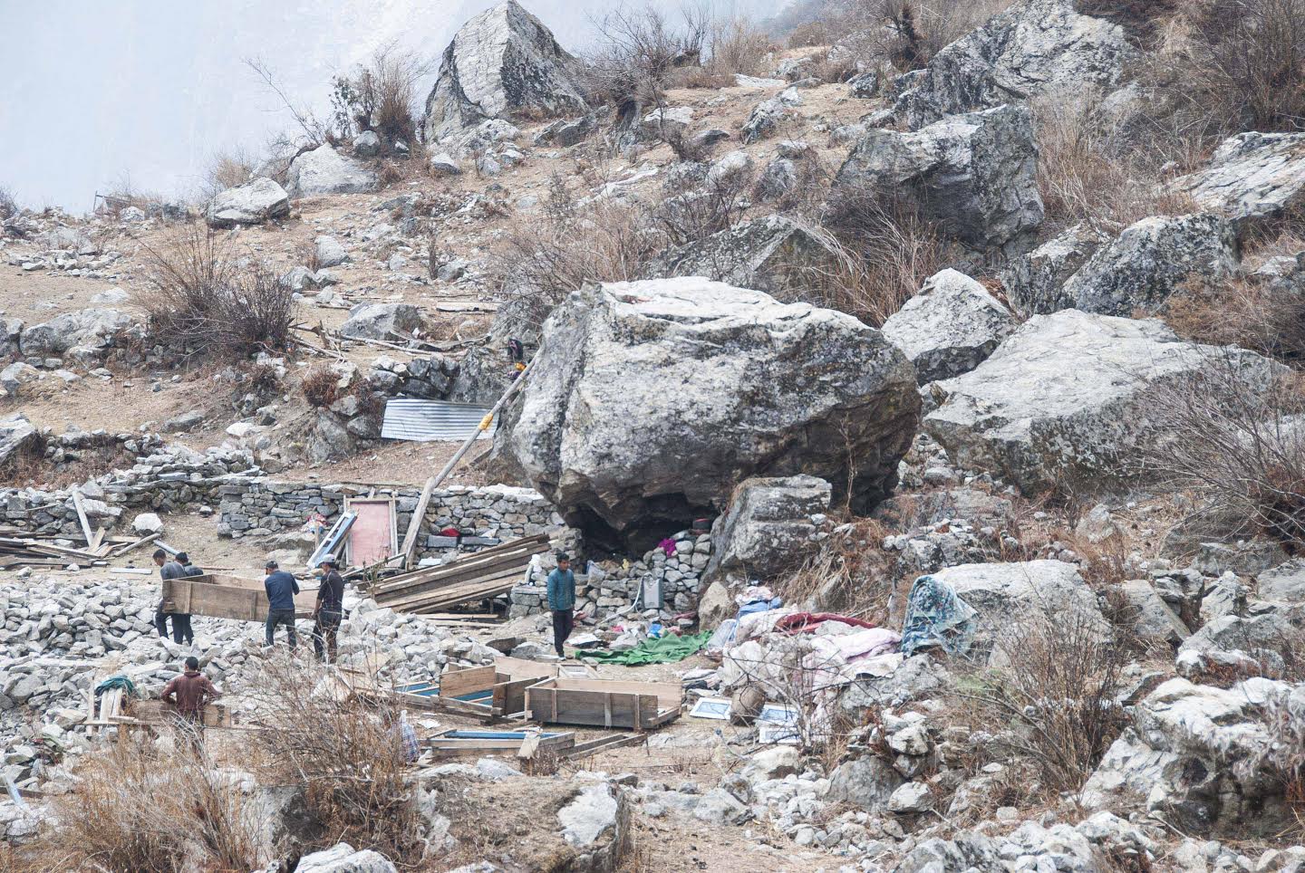 Villagers rebuilding in Langtang, a popular tourist destination in northern Nepal where the 2015 earthquake triggered a monstrous avalanche and killed nearly 400 people, face uncertain future risks. Image by Jane Qiu. Nepal, 2016. Villagers rebuilding in Langtang, a popular tourist destination in northern Nepal where the 2015 earthquake triggered a monstrous avalanche and killed nearly 400 people, face uncertain future risks. Image by Jane Qiu. Nepal, 2016.