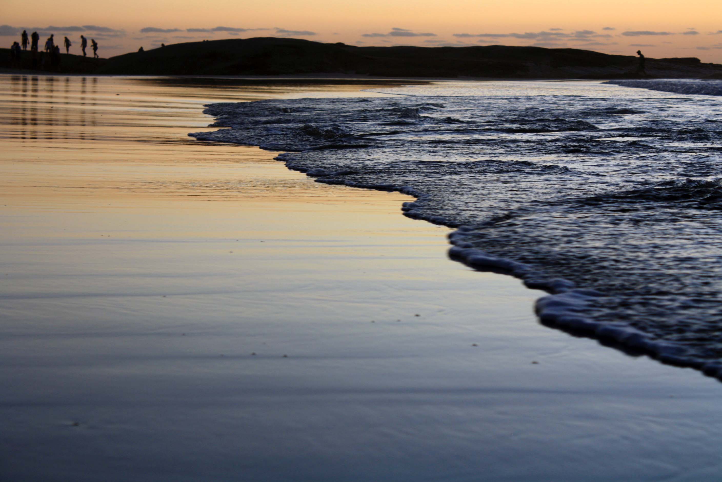 The tide rolls in on the shores of Cape Town, South Africa. Prospecting rights for offshore mining cover 10 percent of the country's exclusive marine economic zone. Image by Mark Olalde. South Africa, 2016. The tide rolls in on the shores of Cape Town, South Africa. Prospecting rights for offshore mining cover 10 percent of the country's exclusive marine economic zone. Image by Mark Olalde. South Africa, 2016.