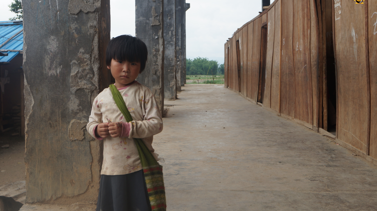 An estimated 45 percent of the IDPs’ children under age 16 were forced to leave school in their home villages because of war. Other girls drop out of school so that they can work and contribute to the family income. Leaving school makes young girls more vulnerable to human trafficking. Image by Lusha Chen. Burma, 2013. Media file: school_girl_in_kachin.png
