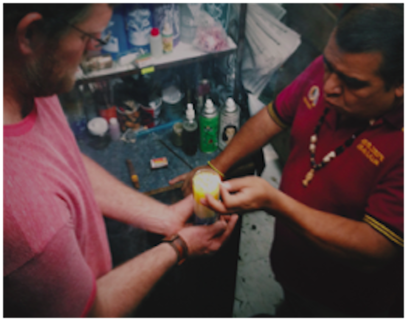 Erik Vance participates in a blessing with a Mexican brujo, or witch doctor, in which he has a self-inflicted curse lifted from him. Image by Meghan Dhaliwal. Mexico, 2016. Erik Vance participates in a blessing with a Mexican brujo, or witch doctor, in which he has a self-inflicted curse lifted from him